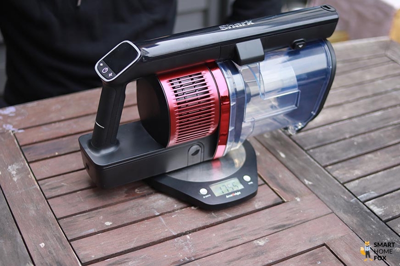 The motor unit of the Shark Anti Hair Wrap Flexology is weighed.